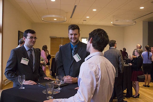 Networking event students talking