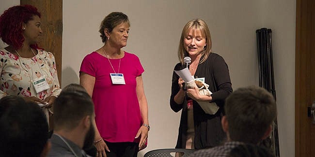 Program director Stacey York, presents Jeanne Beacham with the Excellence in Mentorship of Early Career Scientists Award.