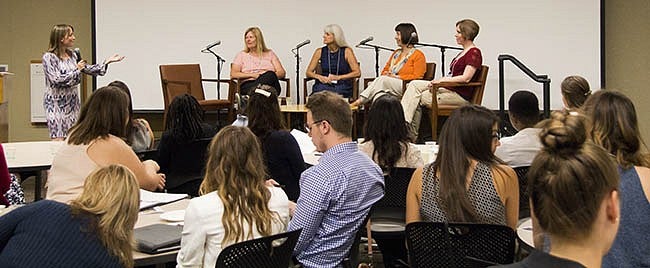 The Senior Leaders Panel answers questions from program director Stacey York.