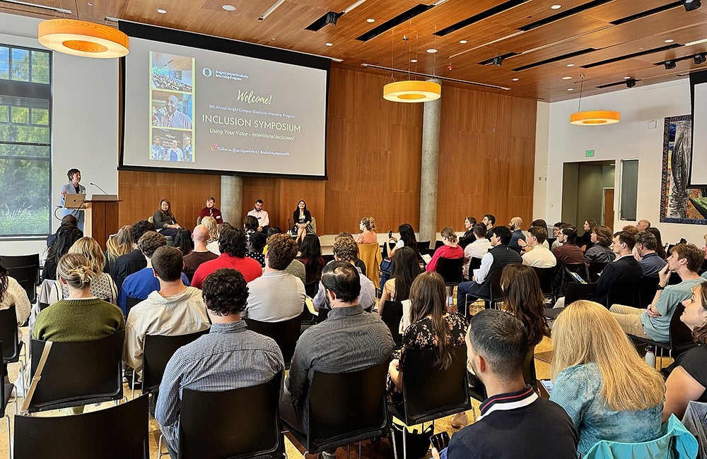 An audience of students watches the Inclusion Leadership Panel