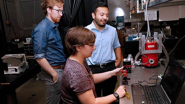 Students at optics table.