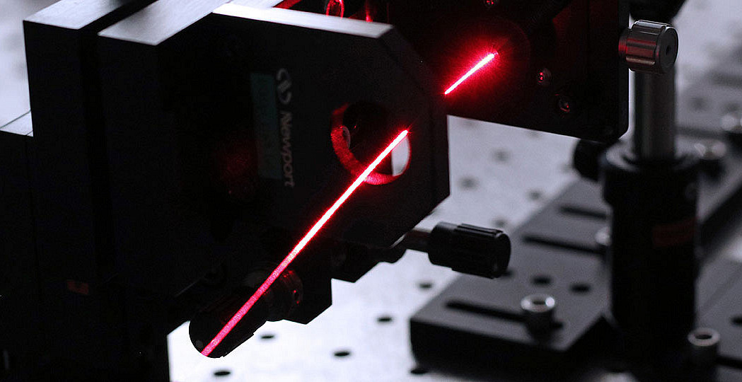 A laser light going through an object